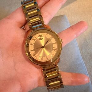 Movado Gold Watch with Roman Numerals